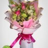 rose bouquet, fuchsia pink roses, pink wrap bouquet, bennies flowers